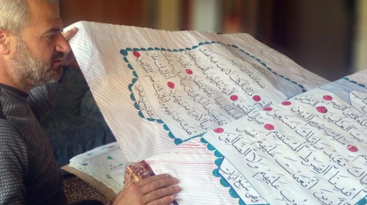 133-015046-syrian-writes-holy-quran-handwriting_700x400