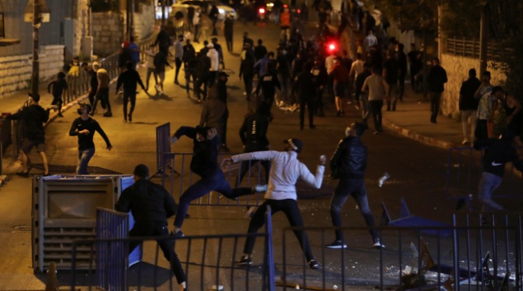 Palestinians clash with Israeli police during the Muslim holy fasting month of Ramadan