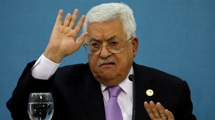 Palestinian President Mahmoud Abbas gestures during a meeting with the Arab media in Ramallah, in the Israeli-occupied West Bank