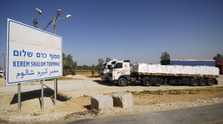 A truck is seen at the gate of the Kerem Shalom crossing, the main passage point for goods entering Gaza, in the southern Gaza Strip town of Rafah
