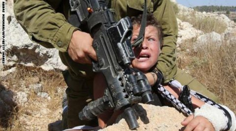 150830073831-01-israeli-soldier-arrests-palestinian-boy-exlarge-169