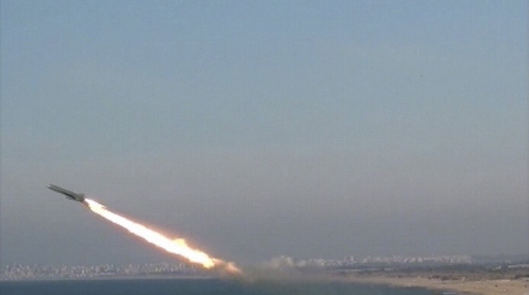A missile is launched during a Syrian armed forces live firing exercise in an undisclosed location