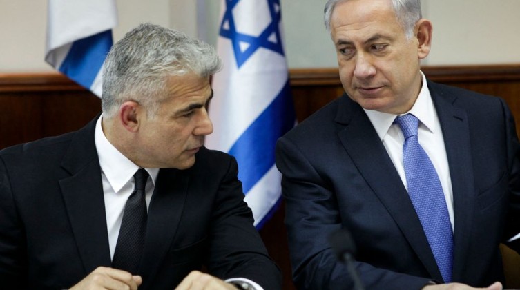 لابيد يدعو نتنياهو للاجتماع للحديث عن الاتفاق النووي الإيراني