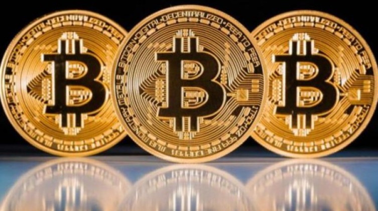 "البيتكوين" تقترب من أعلى مستوى لها خلال عام