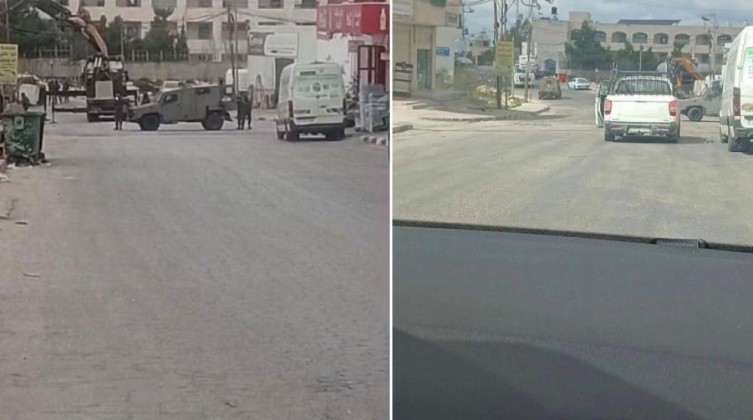 الاحتلال يضع بوابة حديدية في حلحول شمال الخليل